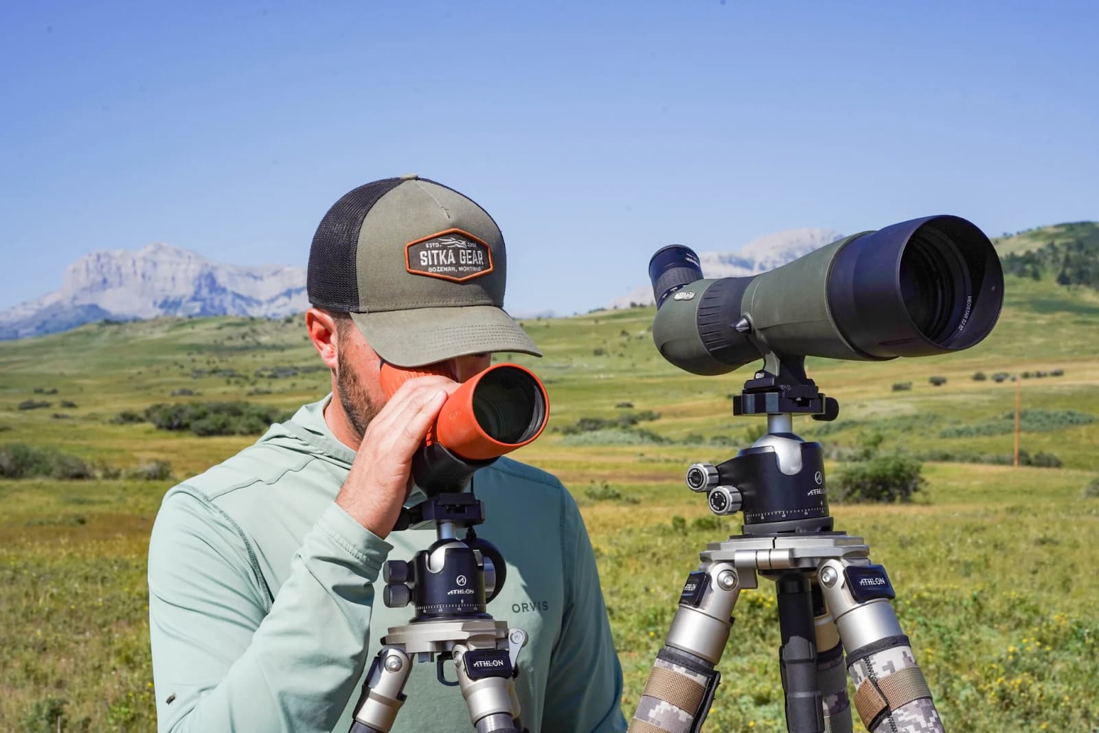 a woman looking through the scope